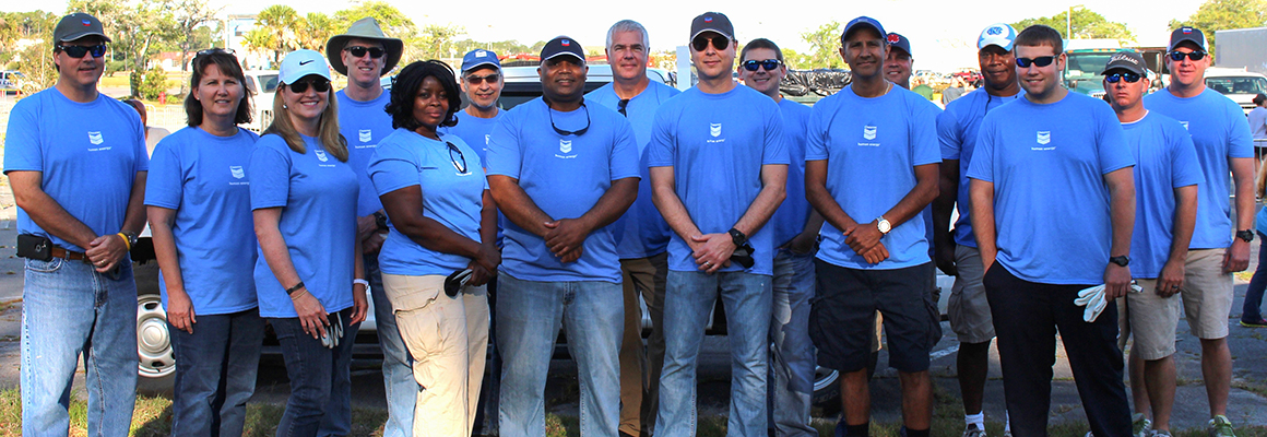 employees volunteering at household hazardous day
